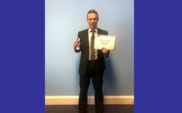 EMS Gibraltar receiving their Bronze performance award