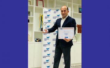 EMS Georgia receiving their Silver performance award