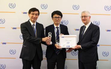 EMS Japan receiving their Silver performance award