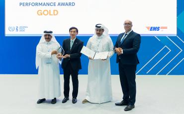 EMS Qatar receiving their Gold performance award