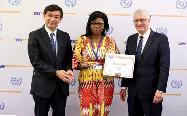 EMS Togo receiving their Bronze performance award