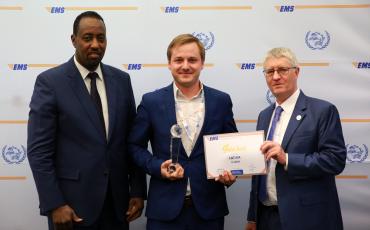 EMS Latvia receiving their Gold performance award