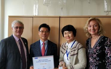 EMS Korea (Rep.) receiving their Silver performance award