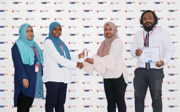 EMS Maldives receiving their Bronze performance award
