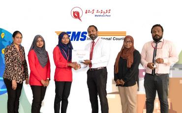 EMS Maldives receiving their Bronze performance award