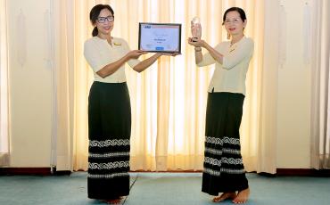 EMS Myanmar receiving their Silver performance award