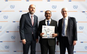 EMS Qatar receiving their Bronze performance award