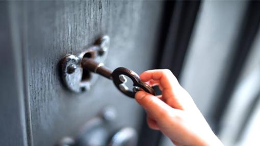 A key opening a locked door