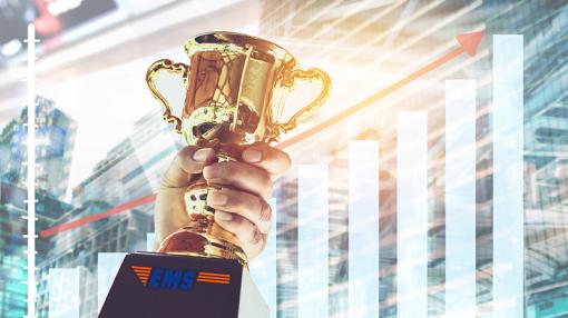 Trophy with growth graphics behind